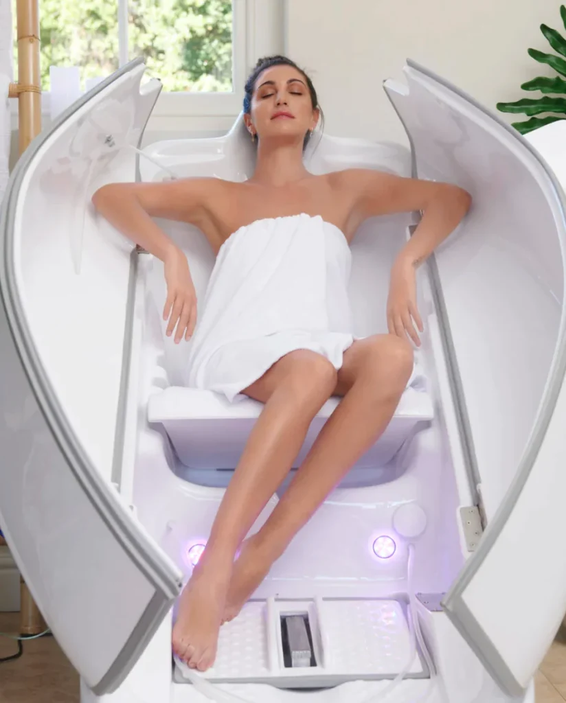 a woman enjoying the benefits of ozone sauna therapy