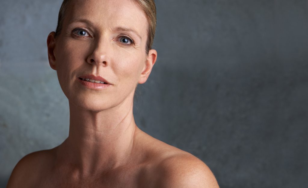 a woman looking at us who has gotten endospheres therapy for firmer skin and elasticity